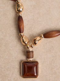 Blythe Long Wooden and Gold Statement Necklace Detail 2 - AS Kids